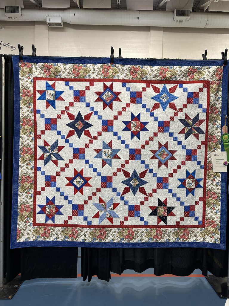 Honorable Mention & Best Longarm Quilting — A-107 Stars of the Heartland