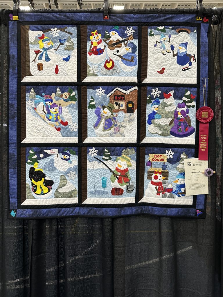 2nd Place — Snowmen at Play, Patricia Dolezal
