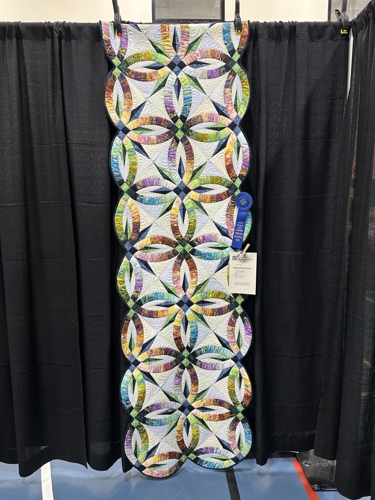1st Place — G-102 Wedding Ring Bed Runner, Paula Keiper
